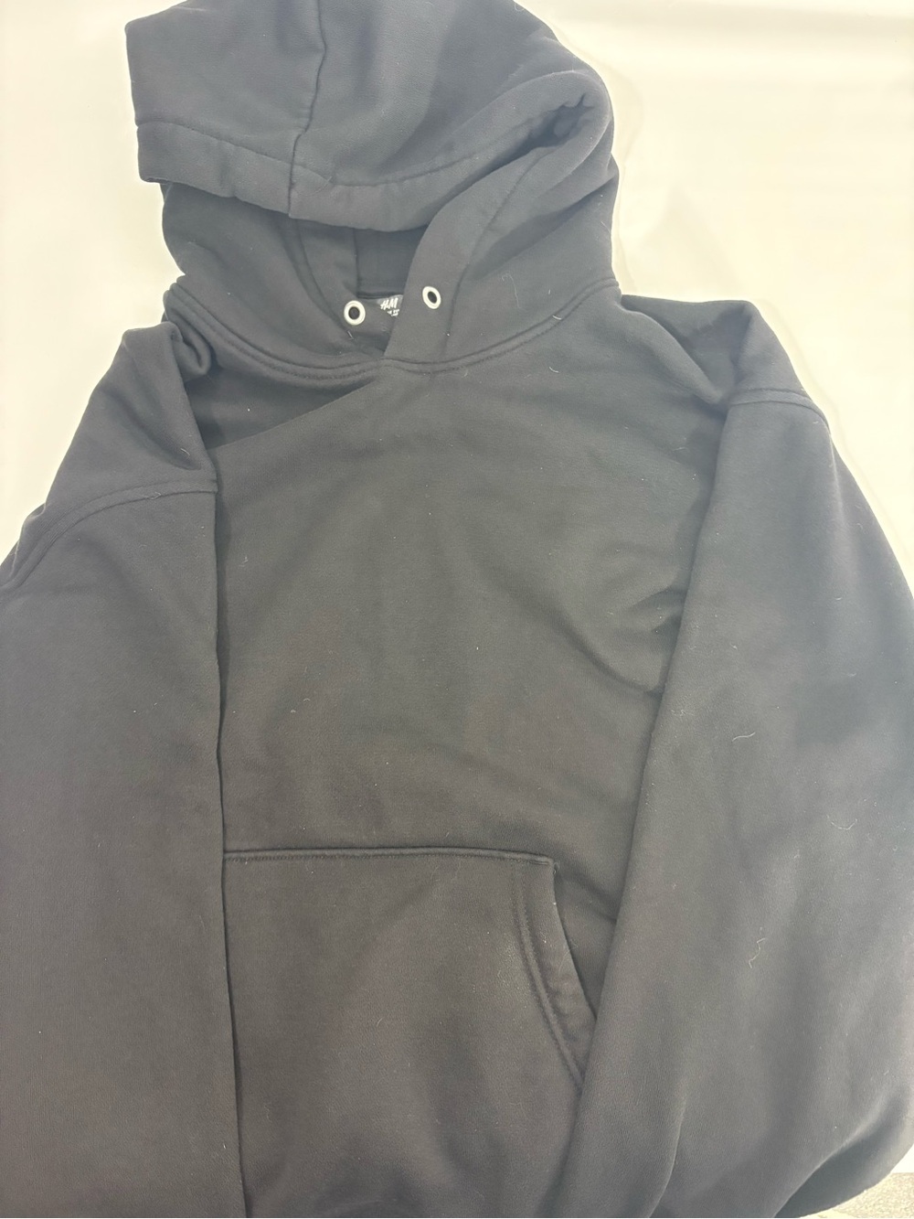 H&M Black Loose Fit Hoodie with Metal Eyelets